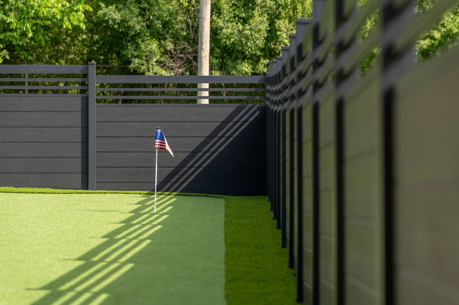 Perimtec horizontal privacy fence with an aluminum frame