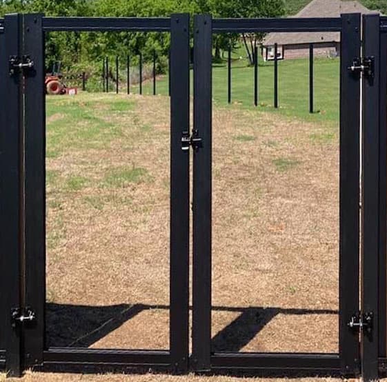 Heavy-duty aluminum gate frame kit installed for a double gate opening.