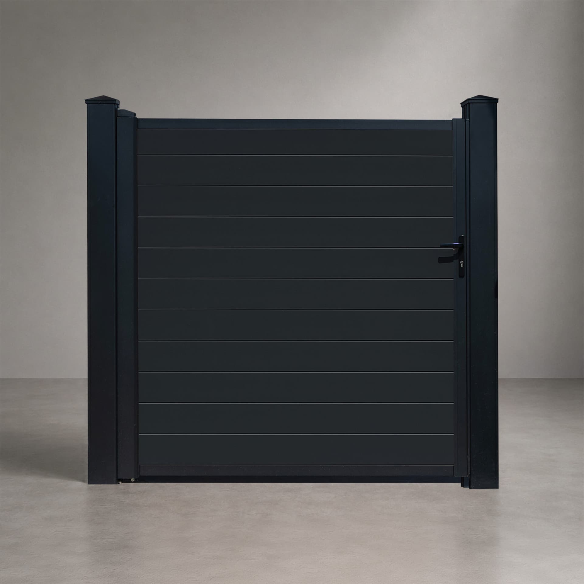 Architectural aluminum swing gate with matte black aluminum infill.