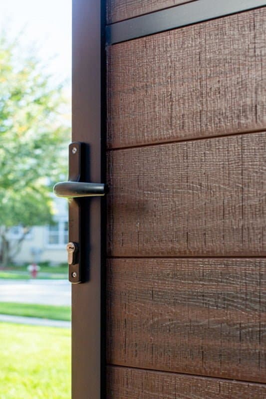 Architectural aluminum gate frame with mortised lock detail.