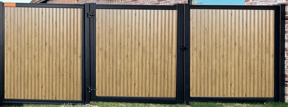 Designer Metal privacy fence using the Perimtec Steel Frame system