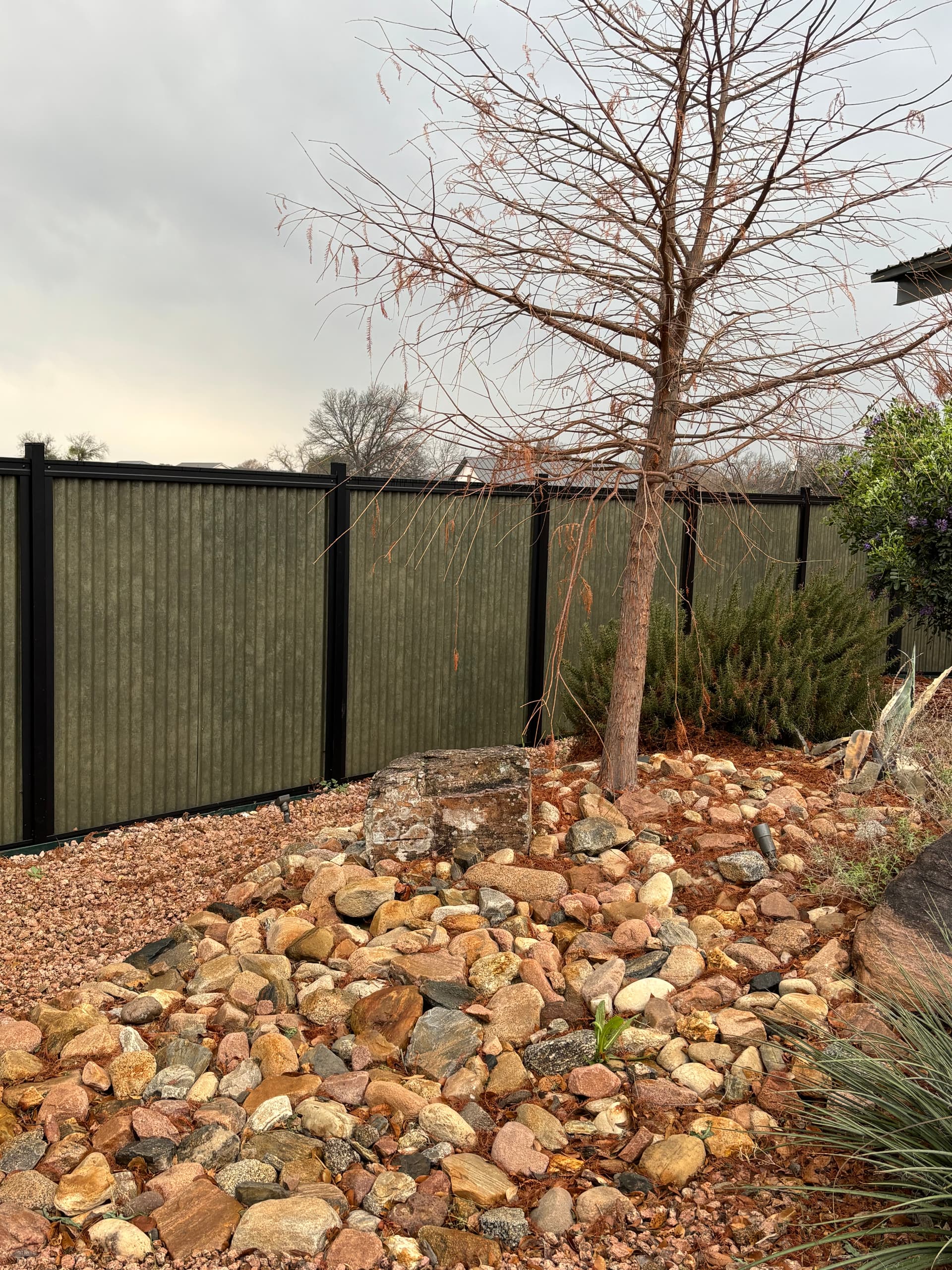 Corrugated metal privacy fence used for commercial screening