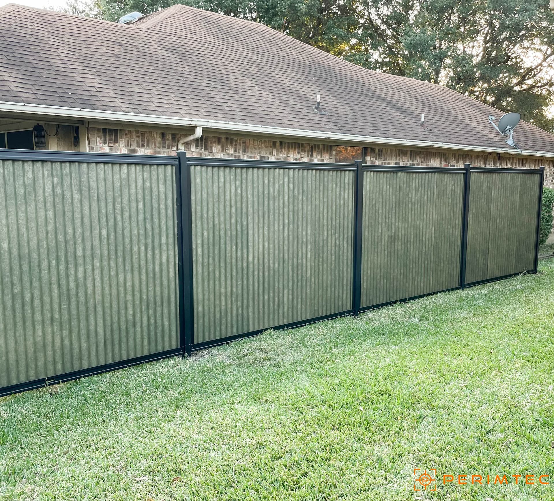 Corrugated Designer Metal fence panel detail in a galvanized Steel Frame system