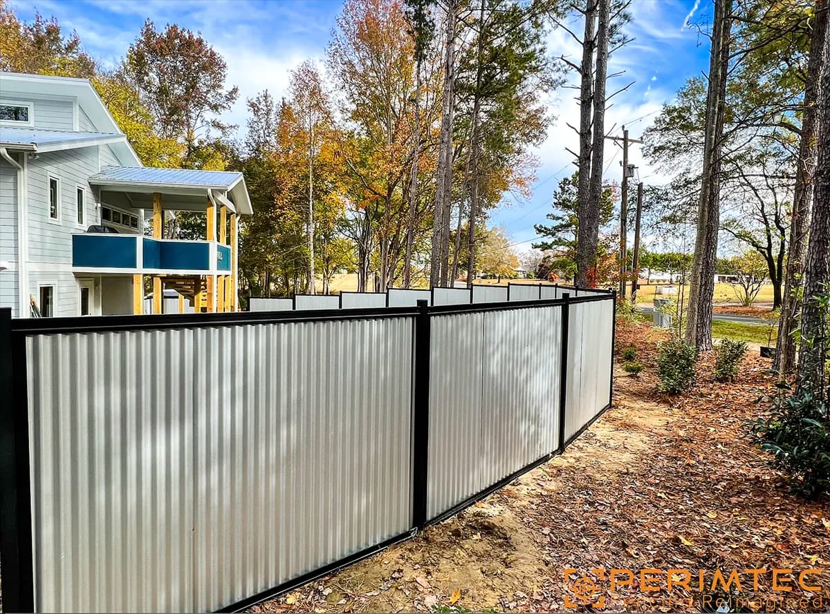 Steel Frame privacy fence with galvanized corrugated metal infill