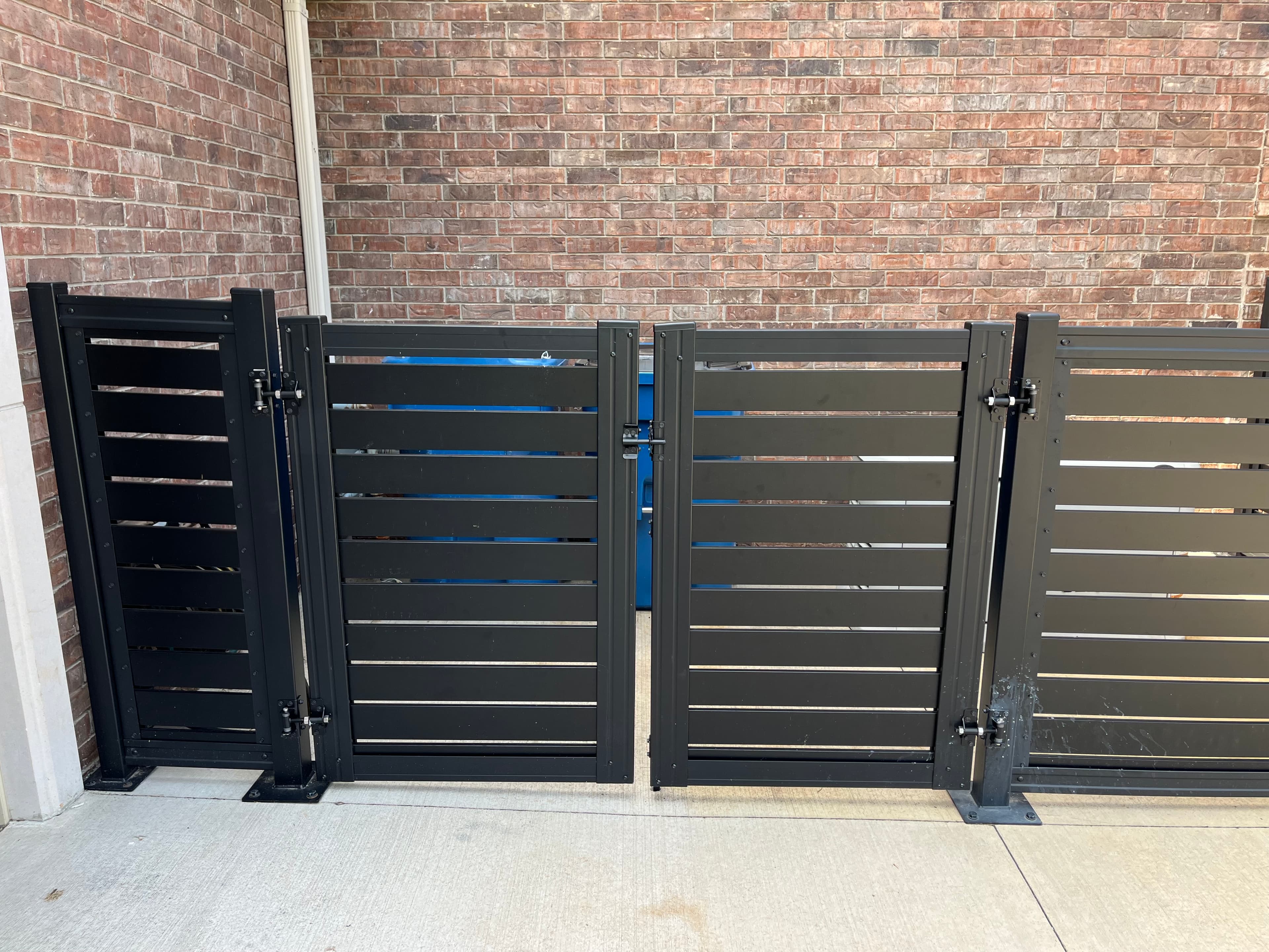 Framed privacy fence gate aligned with adjacent panels for a cohesive look.