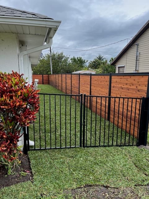 Wood and metal framed fence project