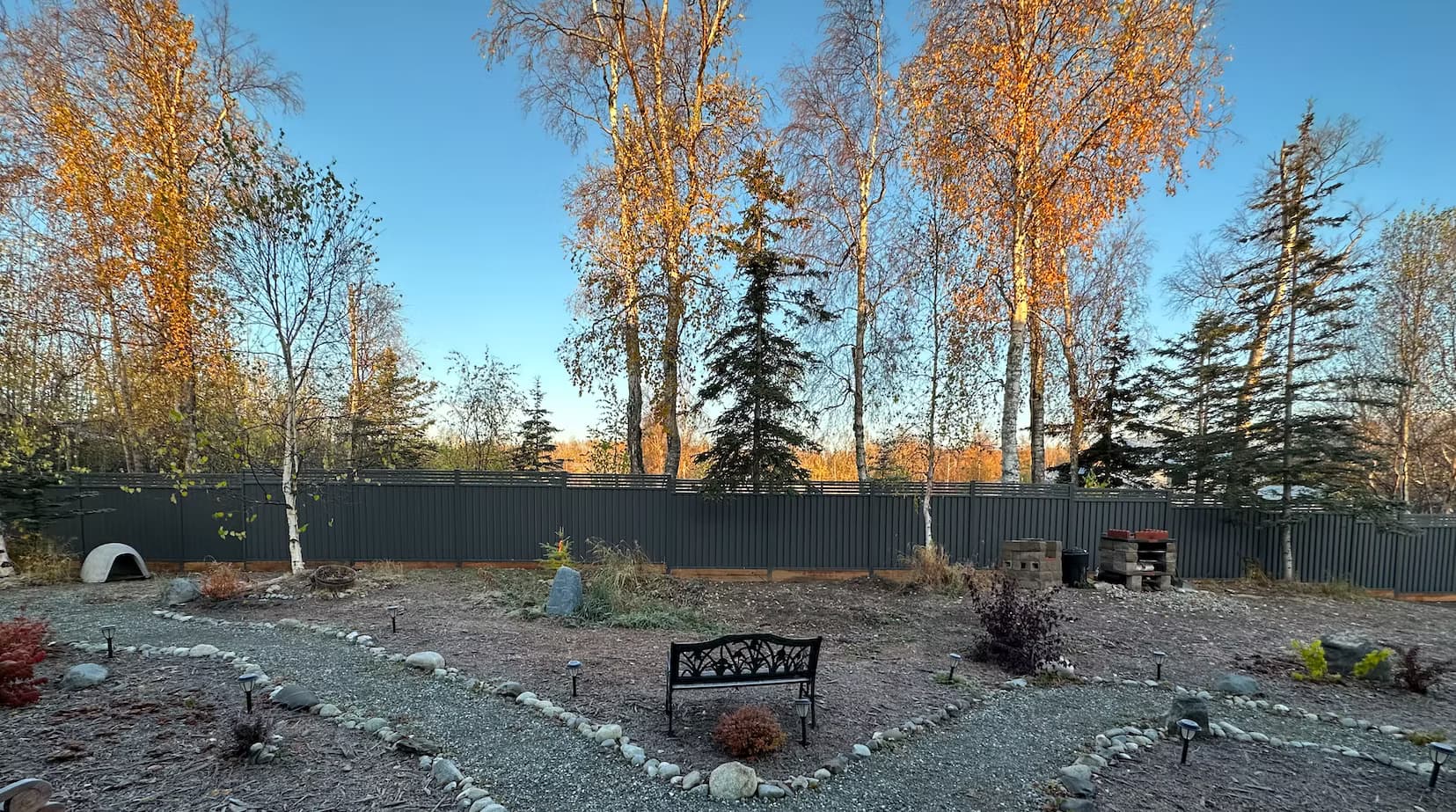 Panoramic view of steel privacy system showing full visual coverage.